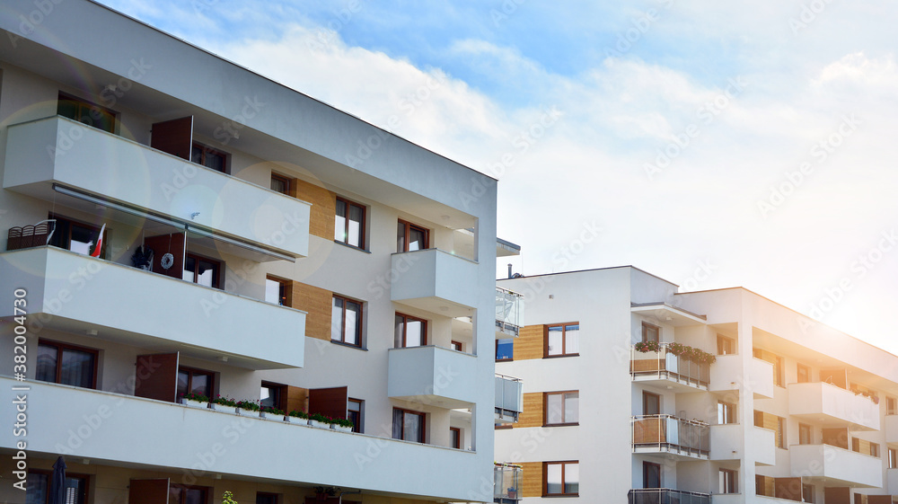 Apartment residential house and home facade architecture and outdoor facilities. Blue sky on the bac