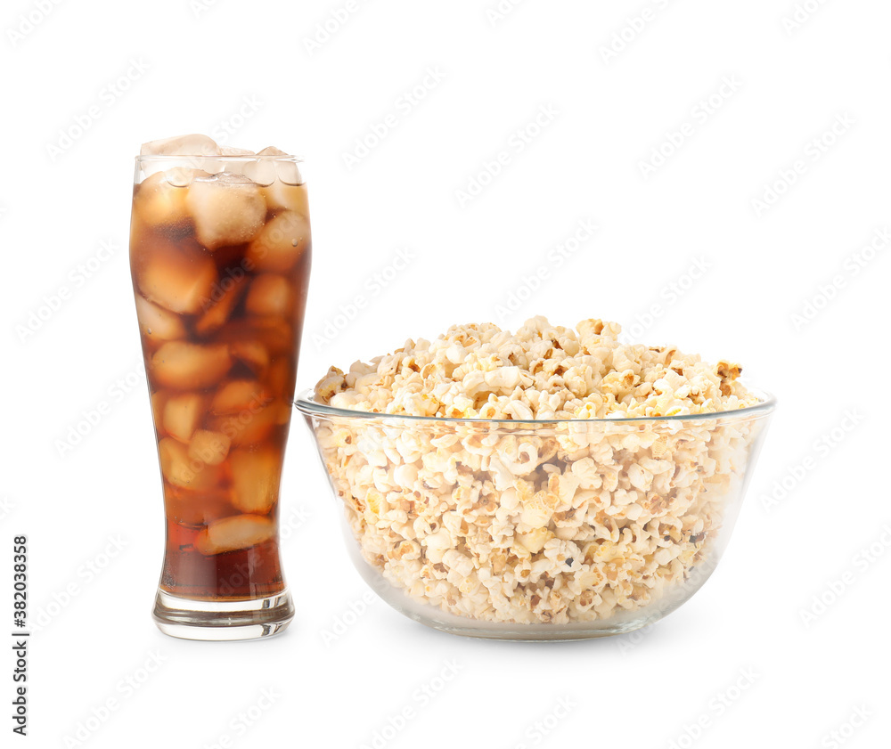 Tasty popcorn and cola on white background