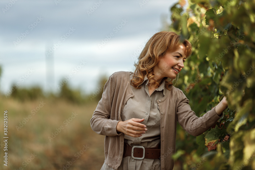 Autumn season coming, smiling woman.