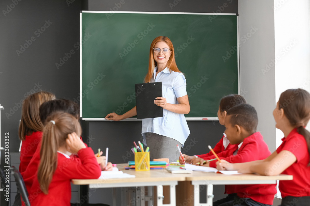 Teacher conducting lesson in classroom