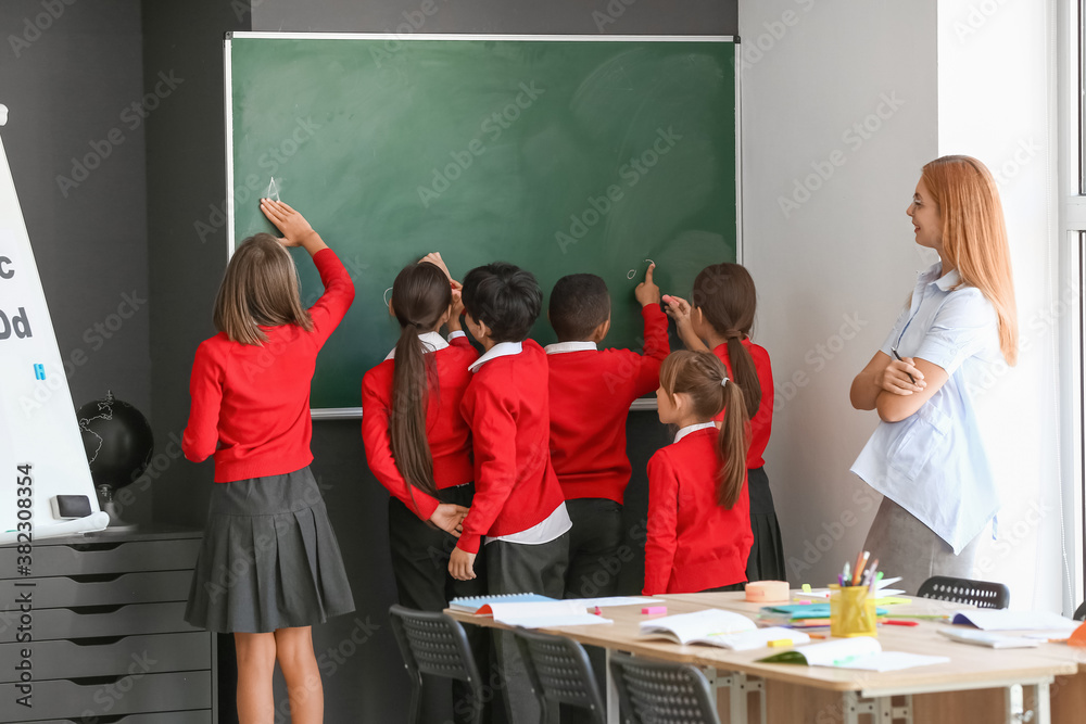 Teacher conducting lesson in classroom