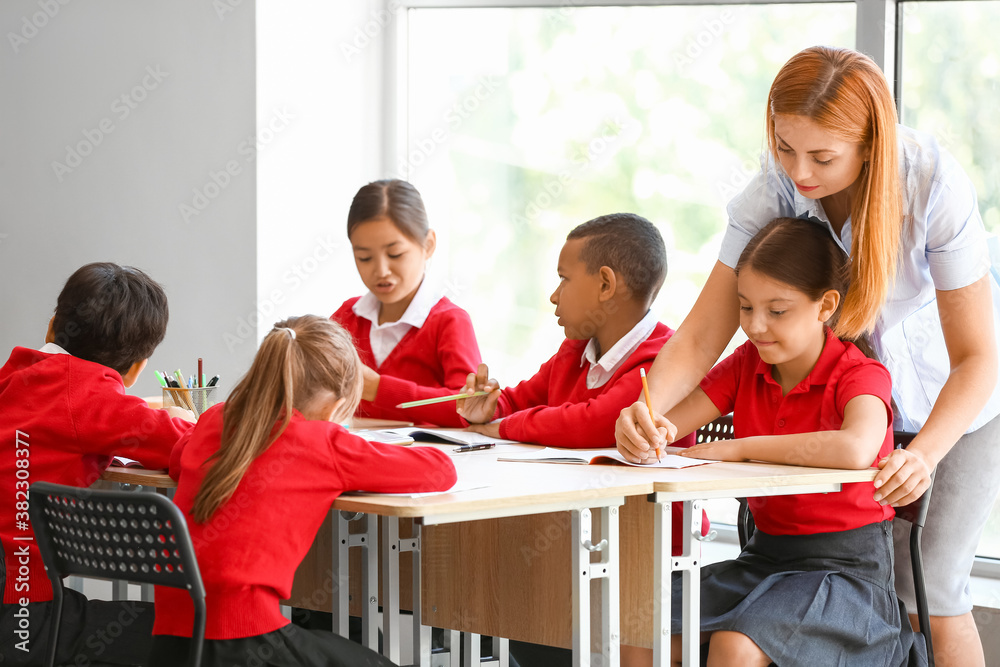 Teacher conducting lesson in classroom