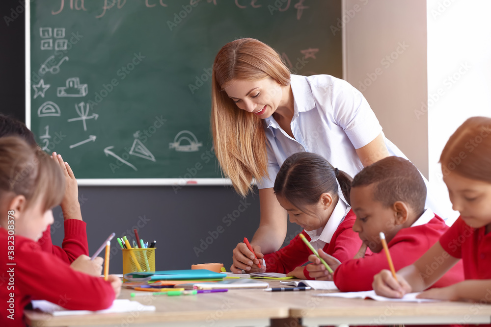 Teacher conducting lesson in classroom