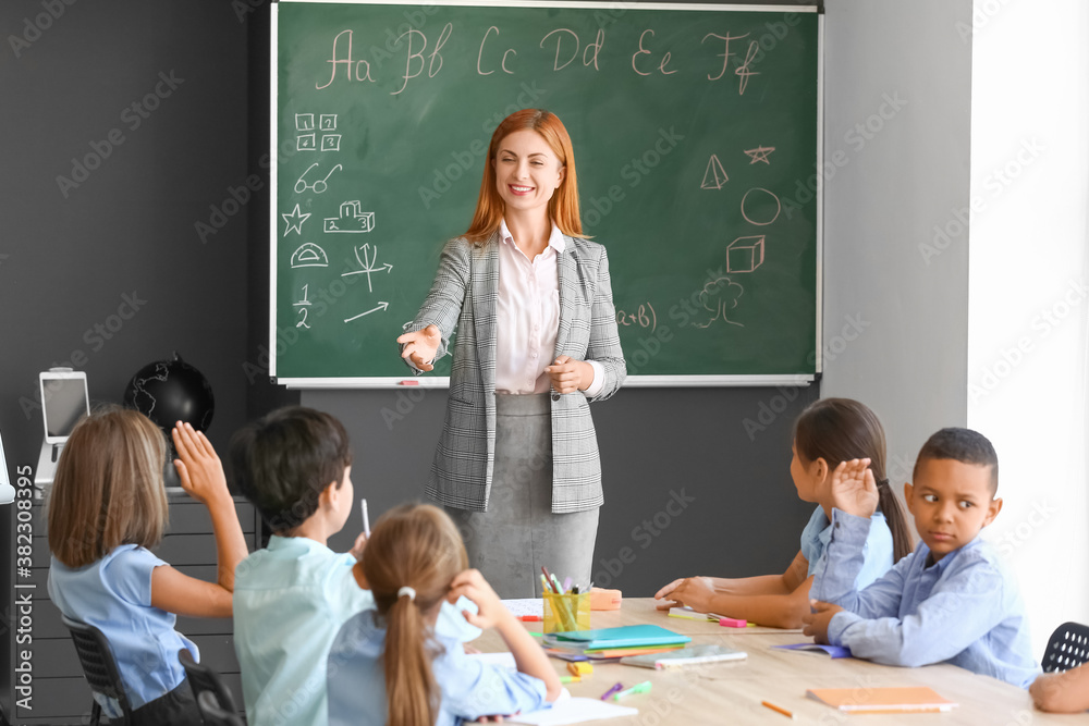 Teacher conducting lesson in classroom