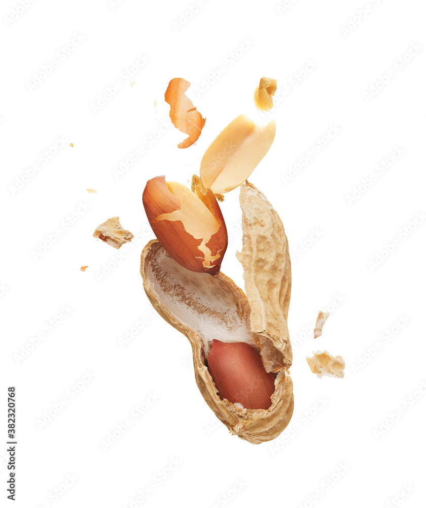 Peanut crushed into pieces over white background