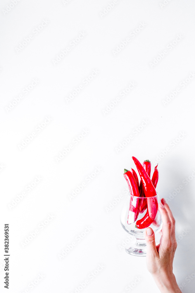 hot food with red chili on white table background top view mock up