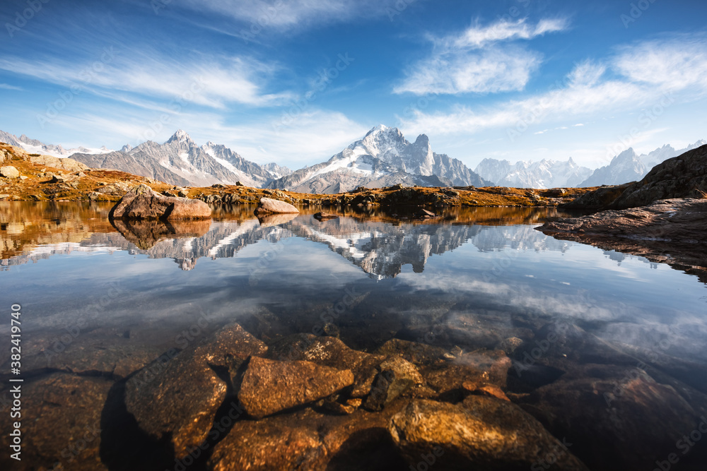 Incredible view of clear water and sky reflection on Lac Blanc lake in France Alps. Monte Bianco mou