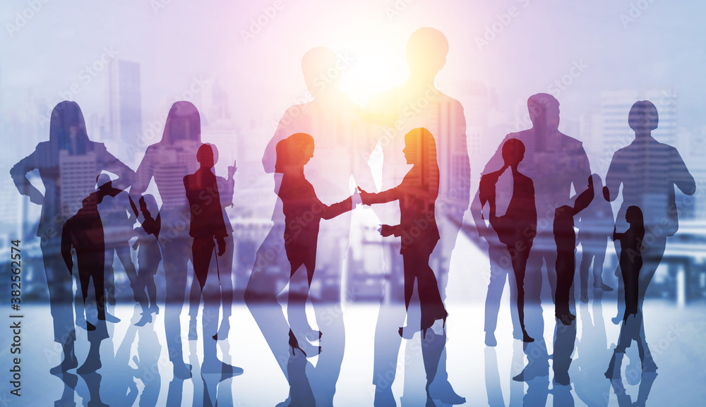 Abstract image of many business people together in group on background of city view with office buil