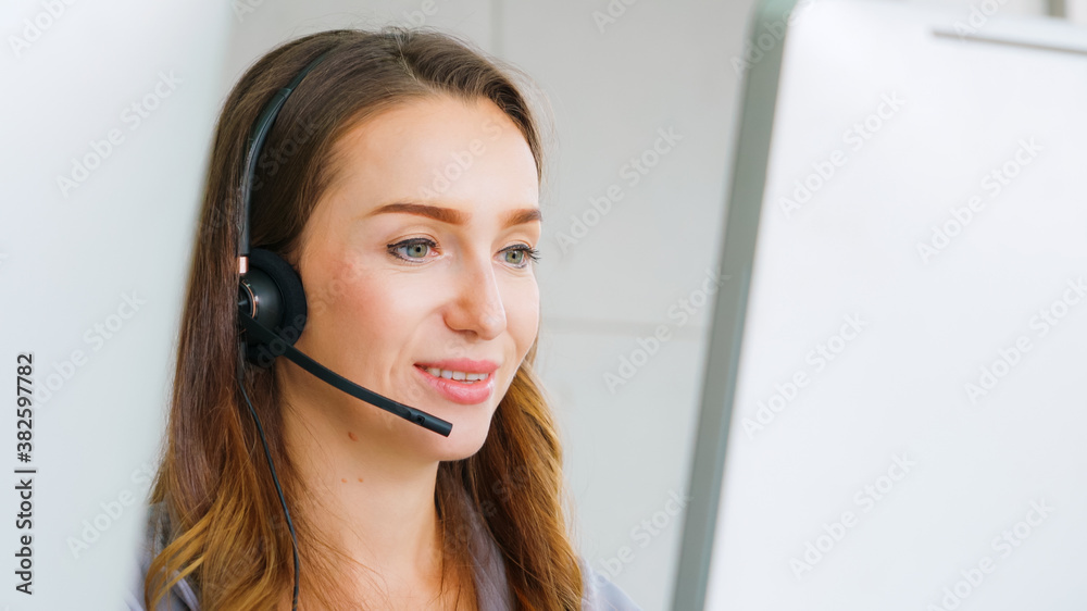 Business people wearing headset working in office to support remote customer or colleague. Call cent