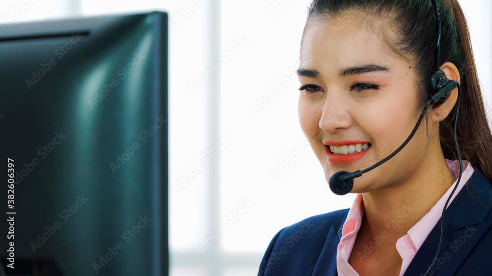 Business people wearing headset working in office to support remote customer or colleague. Call cent