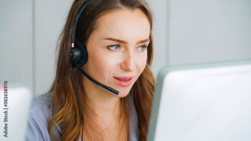 Business people wearing headset working in office to support remote customer or colleague. Call cent