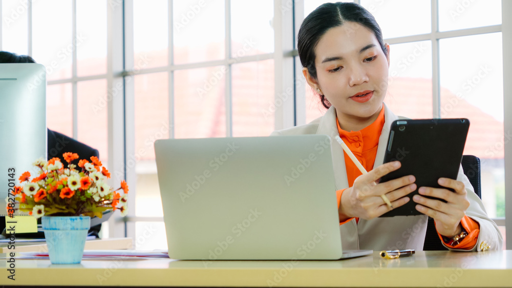 Business people working at table in modern office room while analyzing financial data report .