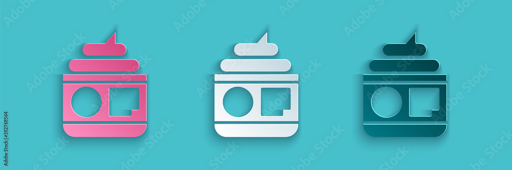 Paper cut Cream or lotion cosmetic tube icon isolated on blue background. Body care products for men