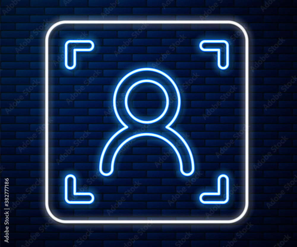 Glowing neon line Face recognition icon isolated on brick wall background. Face identification scann