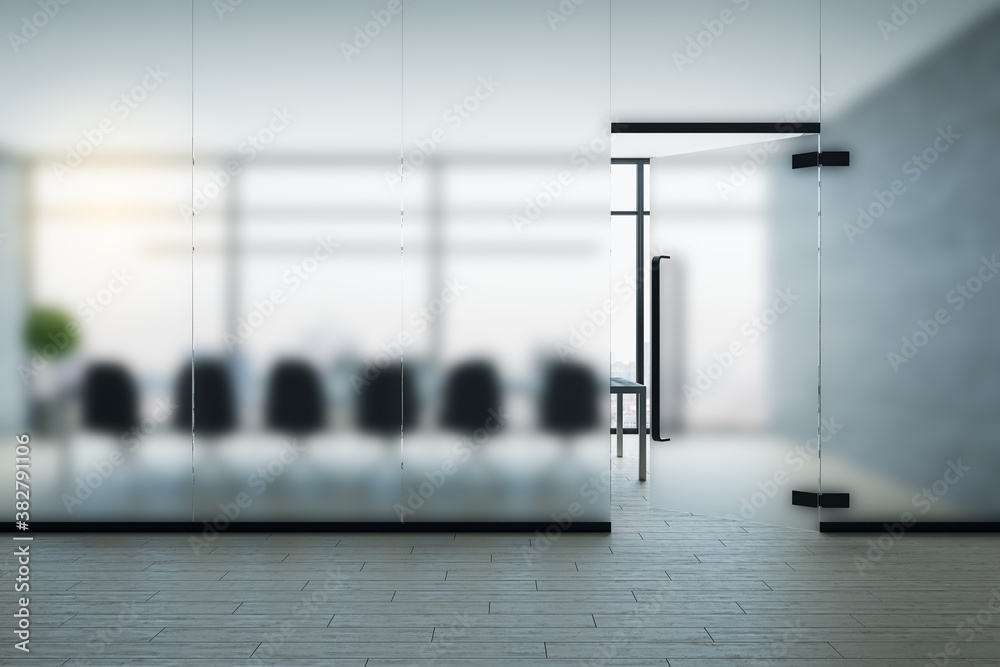 Contemporary conference room with city view and blurred glass wall.