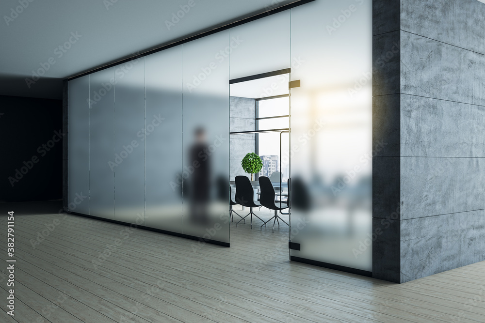 Businessman standing in meeting room