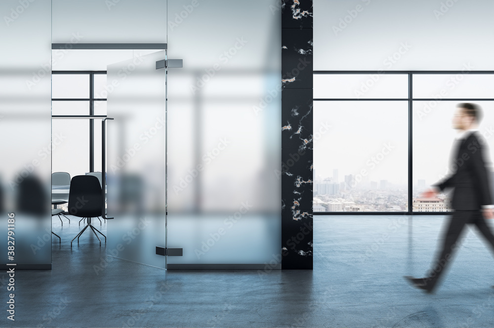 Businessman walking in conference interior hall