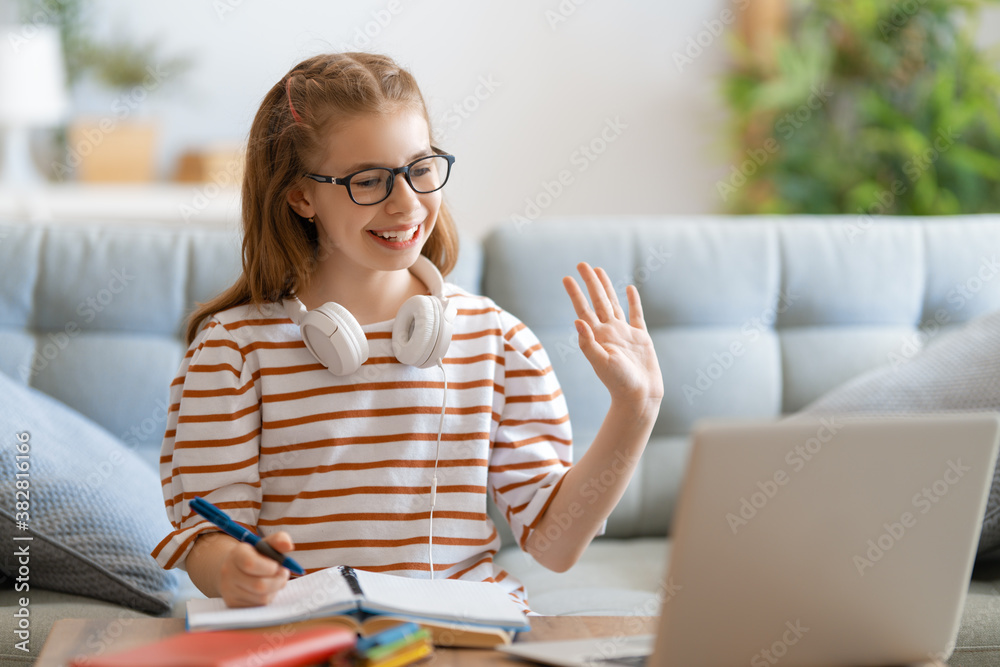 Girl doing homework or online education.