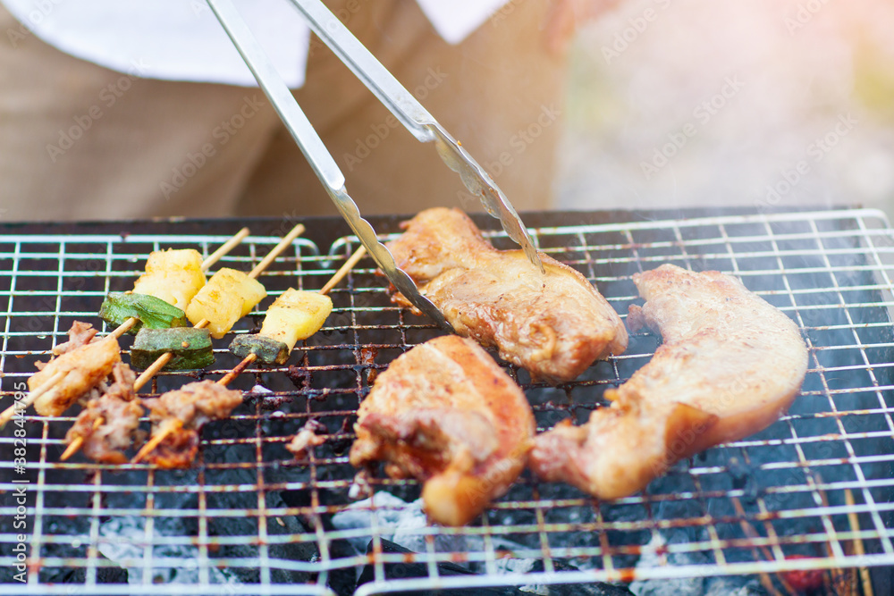 Delicious Barbecue Steaks Grilled on Charcoal Grills.