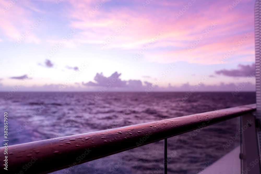 golden twilight senset on wooden curise deck vacation summer time