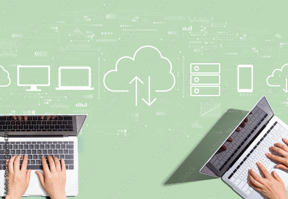 Cloud computing with people working together with laptop computers