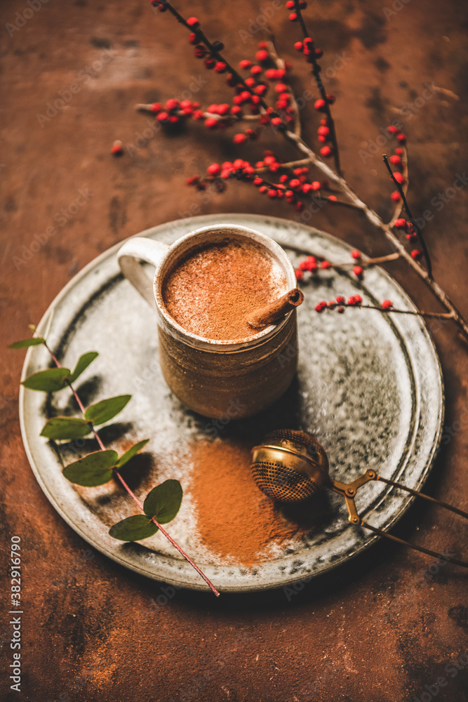 Turkish traditional wintertime hot drink Salep. Mug of sweet warming Salep drink with ground cinnamo