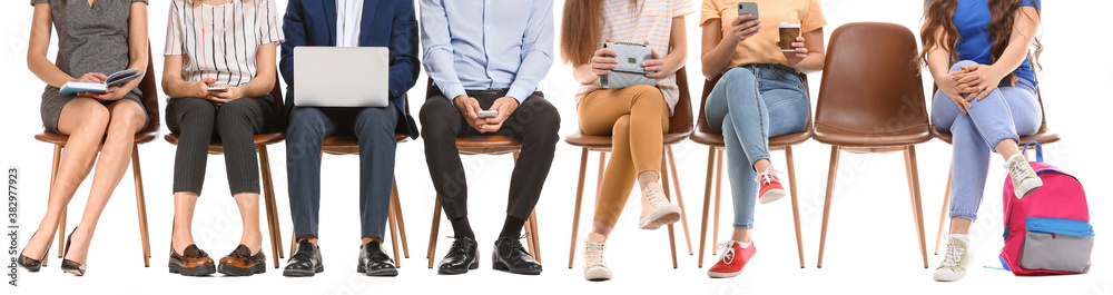 Different people waiting in line on white background