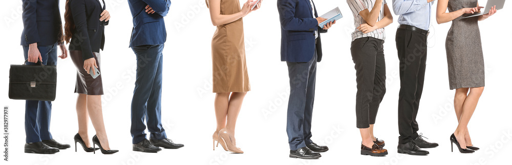 Business people waiting in line on white background