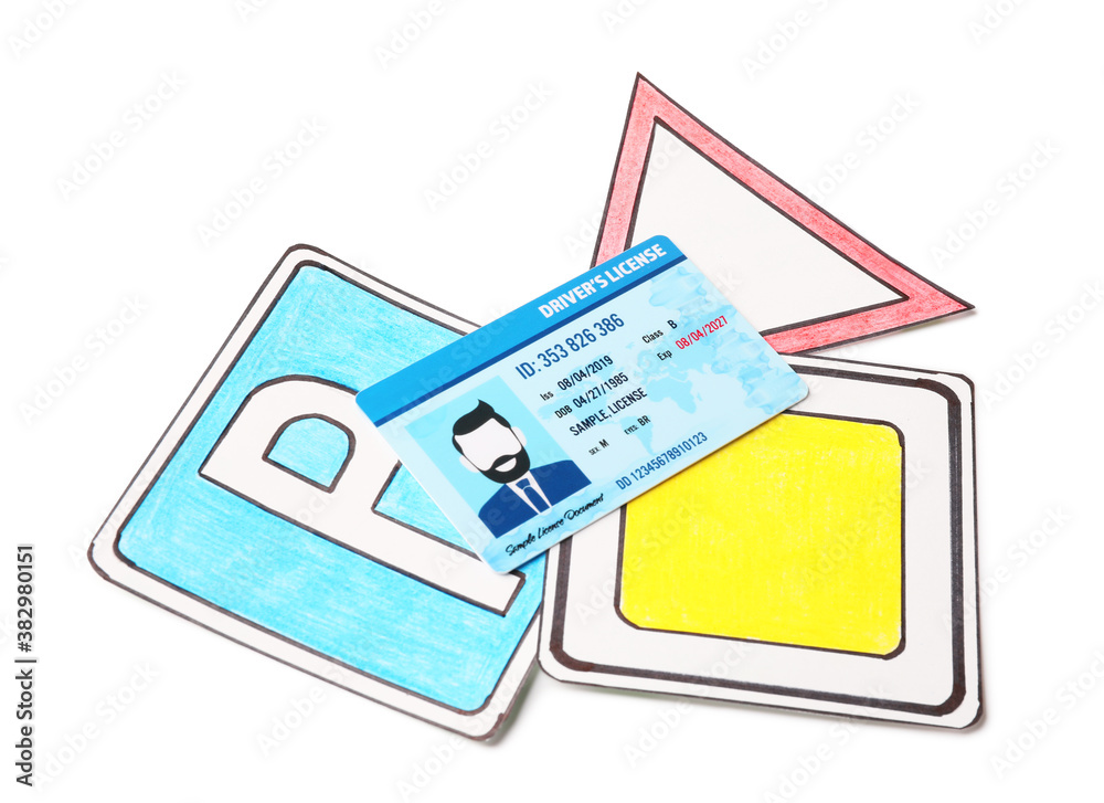 Driving license with road signs on white background