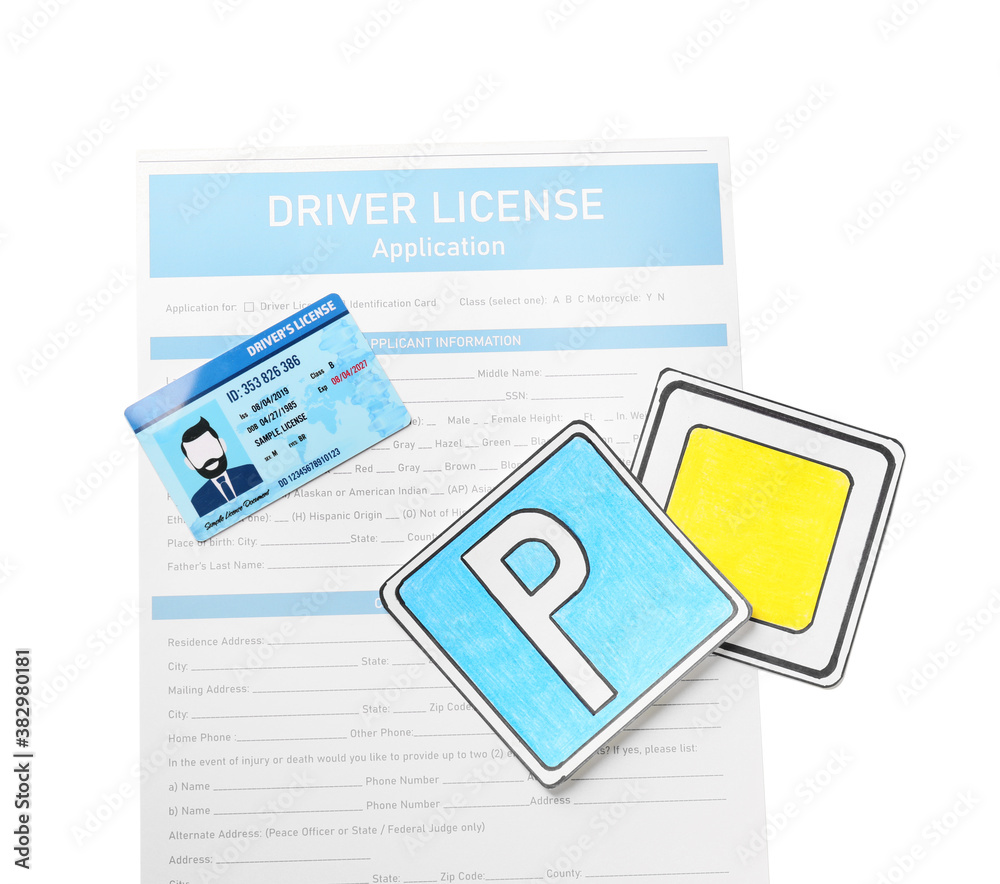 Driving license with application form and road signs on white background