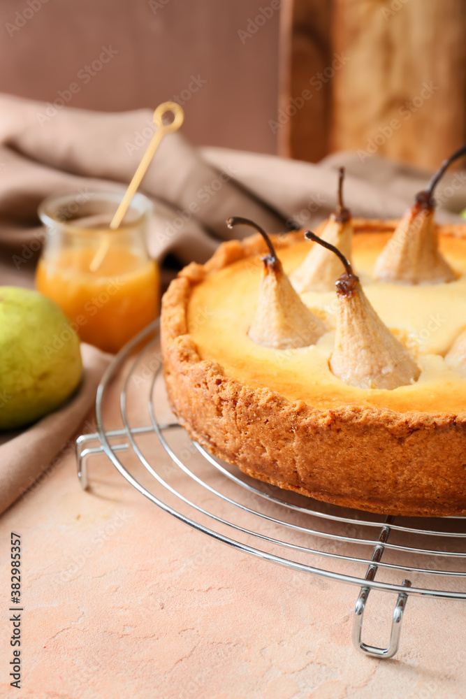 Tasty pear cake on table