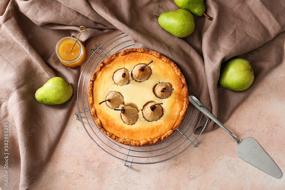 Tasty pear cake on color background