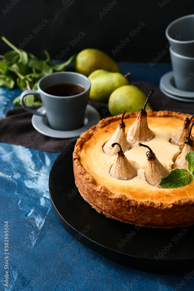 Tasty pear cake on table