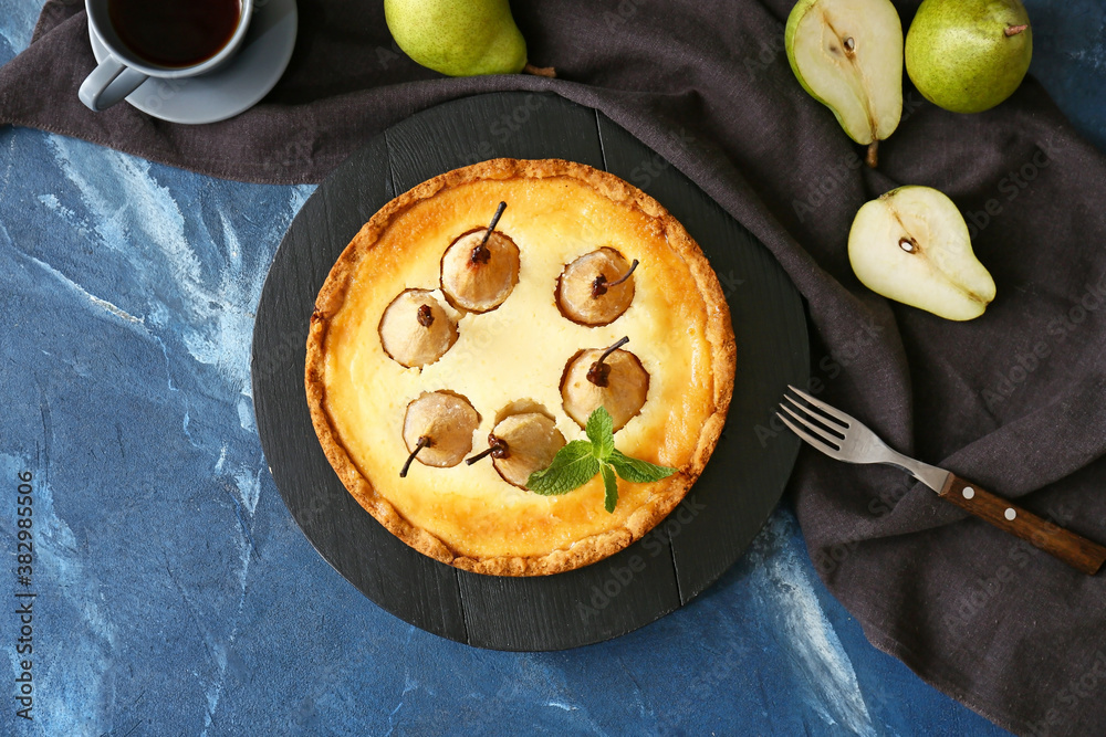 Tasty pear cake on color background