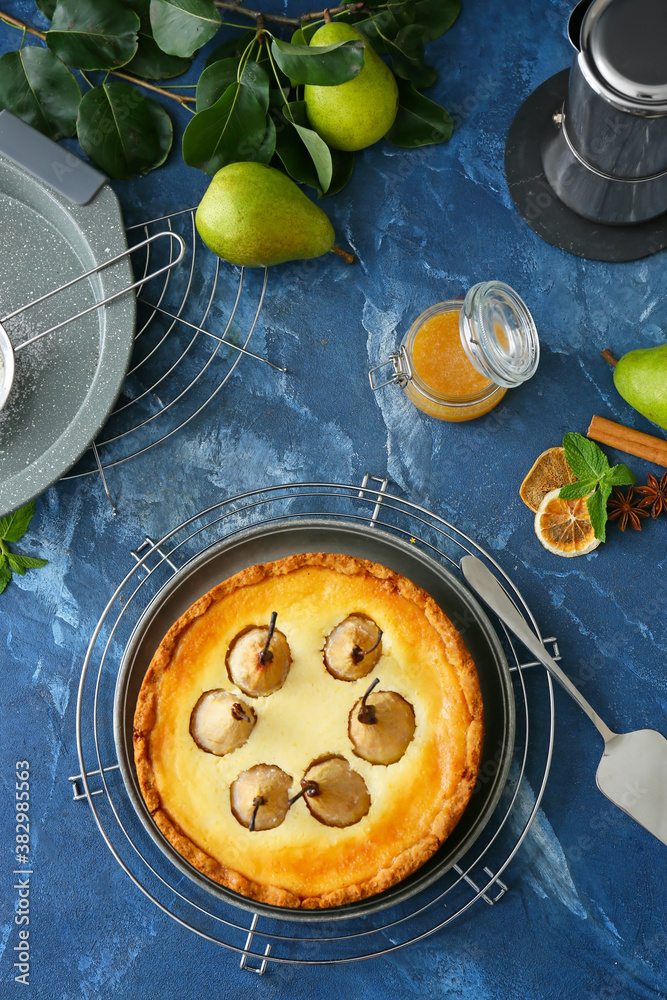 Tasty pear cake on color background