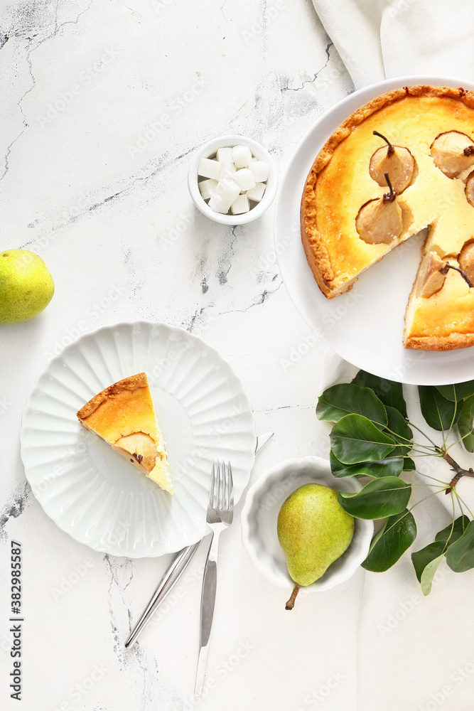 Tasty pear cake on white background