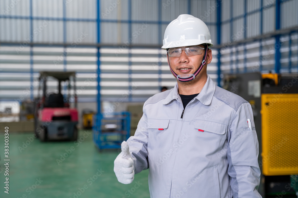 Portrait of manual asian man worker is standing show confidence with confident with working suite dr