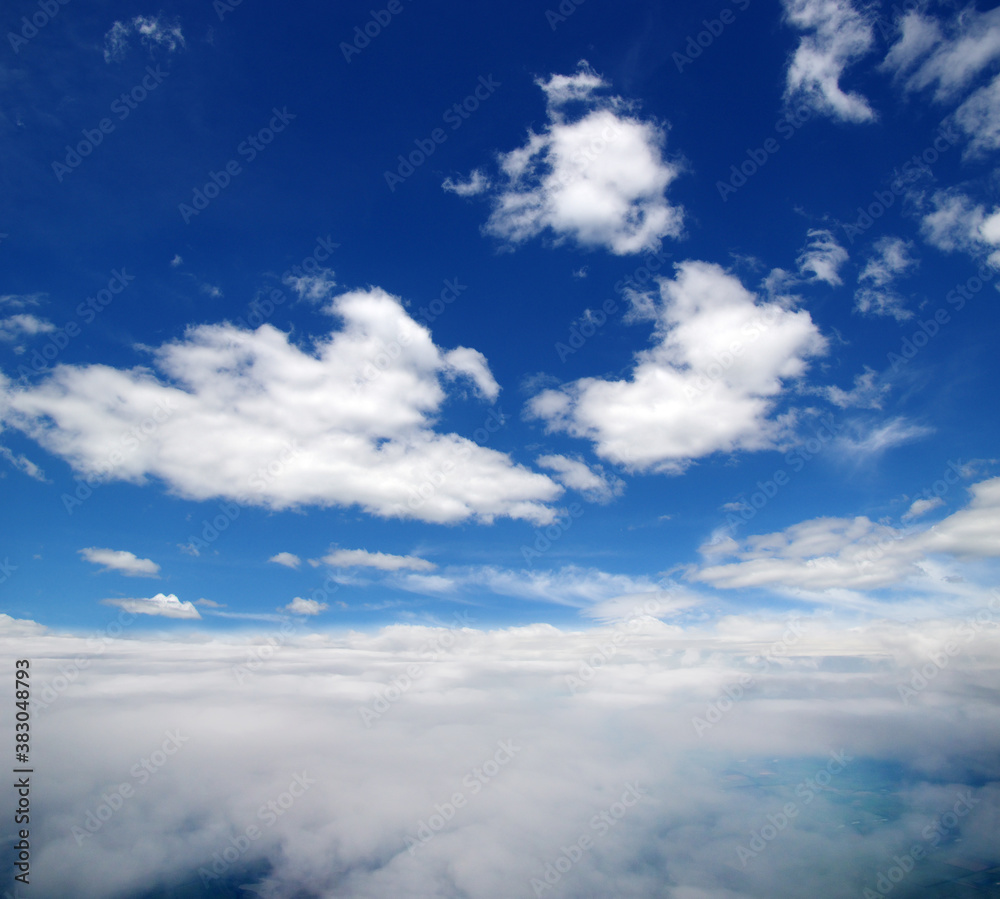 White clouds airplane flying