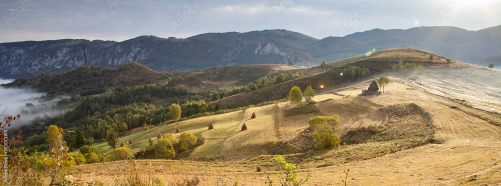 rural Romania beautiful foggy morning landscape in Apuseni mountains