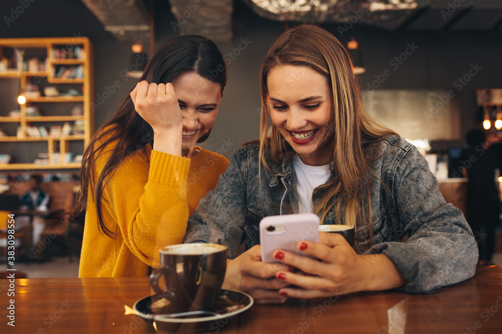 Friends meeting at a coffee shop