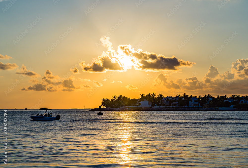 Sunset, view of Sunset y Island from Mallory Square, Key West, Florida, US