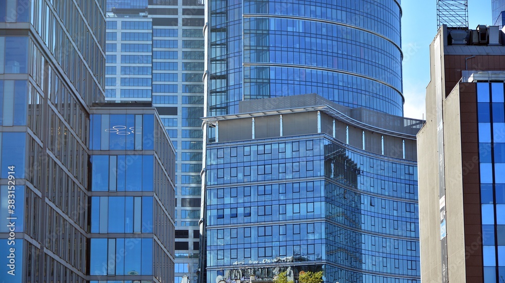 Fragment facade of a modern office building with glazing, perspective. 