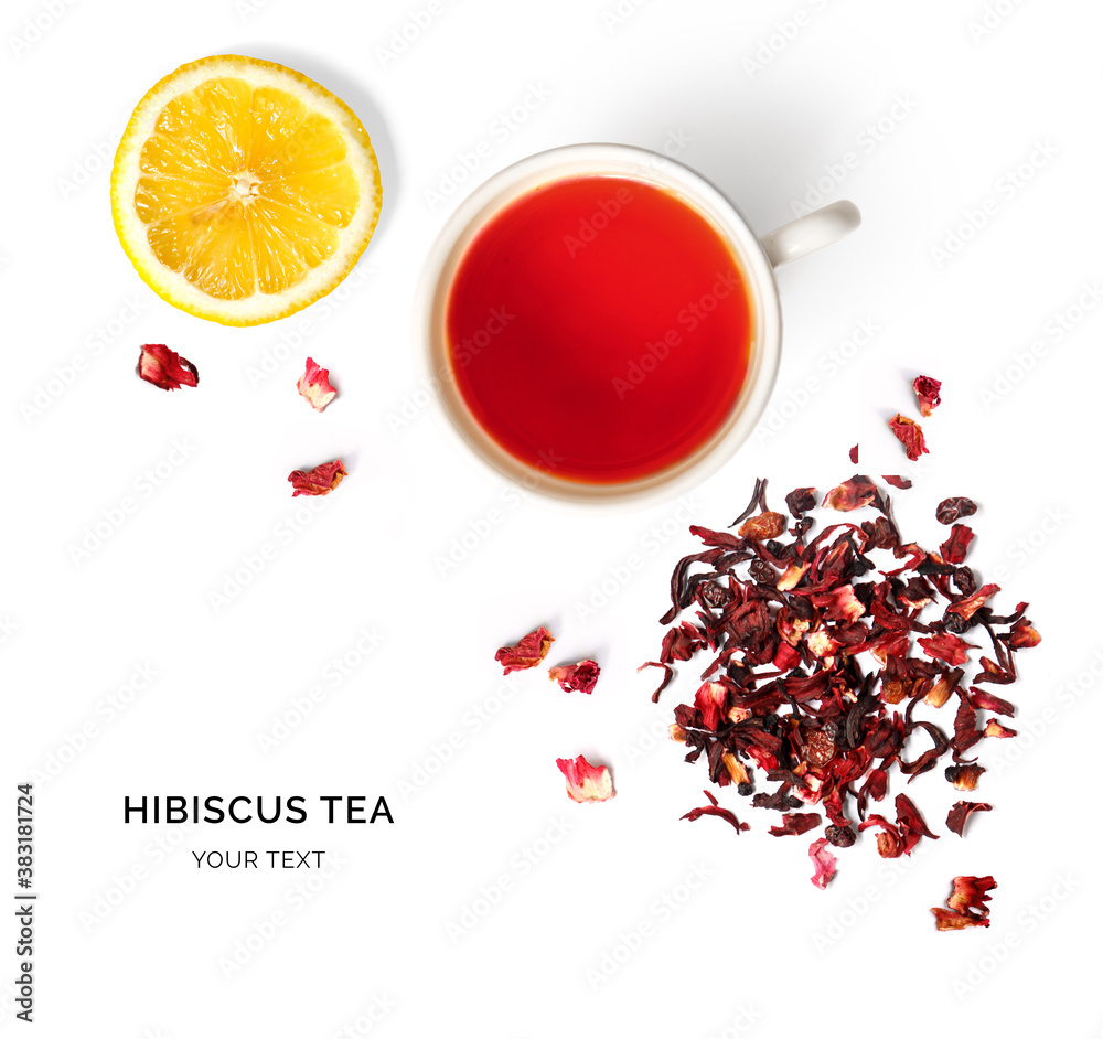 Creative layout made of cup of hibiscus tea and lemon on a white background. Top view.