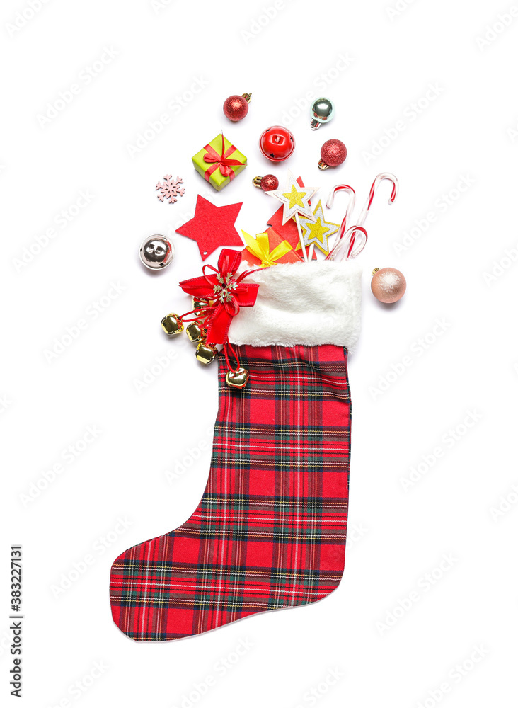 Christmas sock with decor on white background