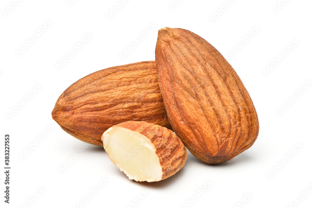 Close-up Almond seeds  with cut in half isolated on white background.