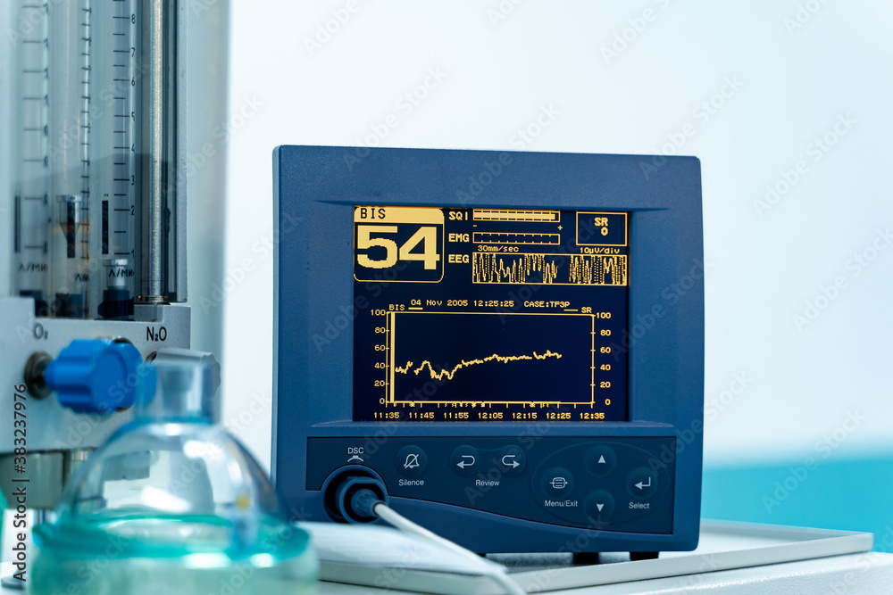 Special equipment in hospital surgery room. Screen with heart rate or beat. Operation process.