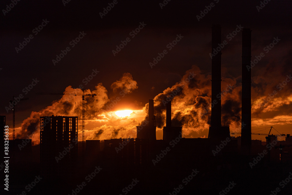 Steam from the power plant at sunrise