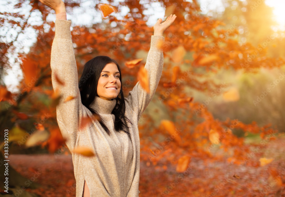 Young brunette woman lifestyle portrait shot in autumn period.