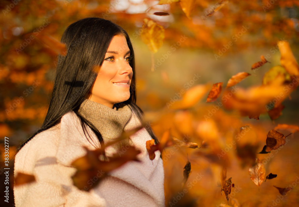 Young brunette woman lifestyle portrait shot in autumn period.