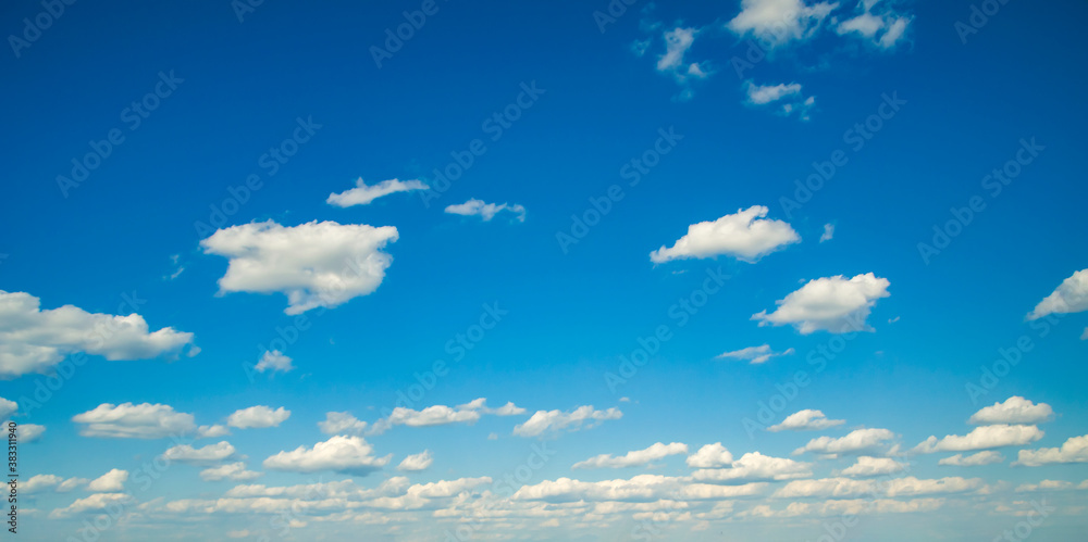 beautiful white clouds on blue sky sunny day background